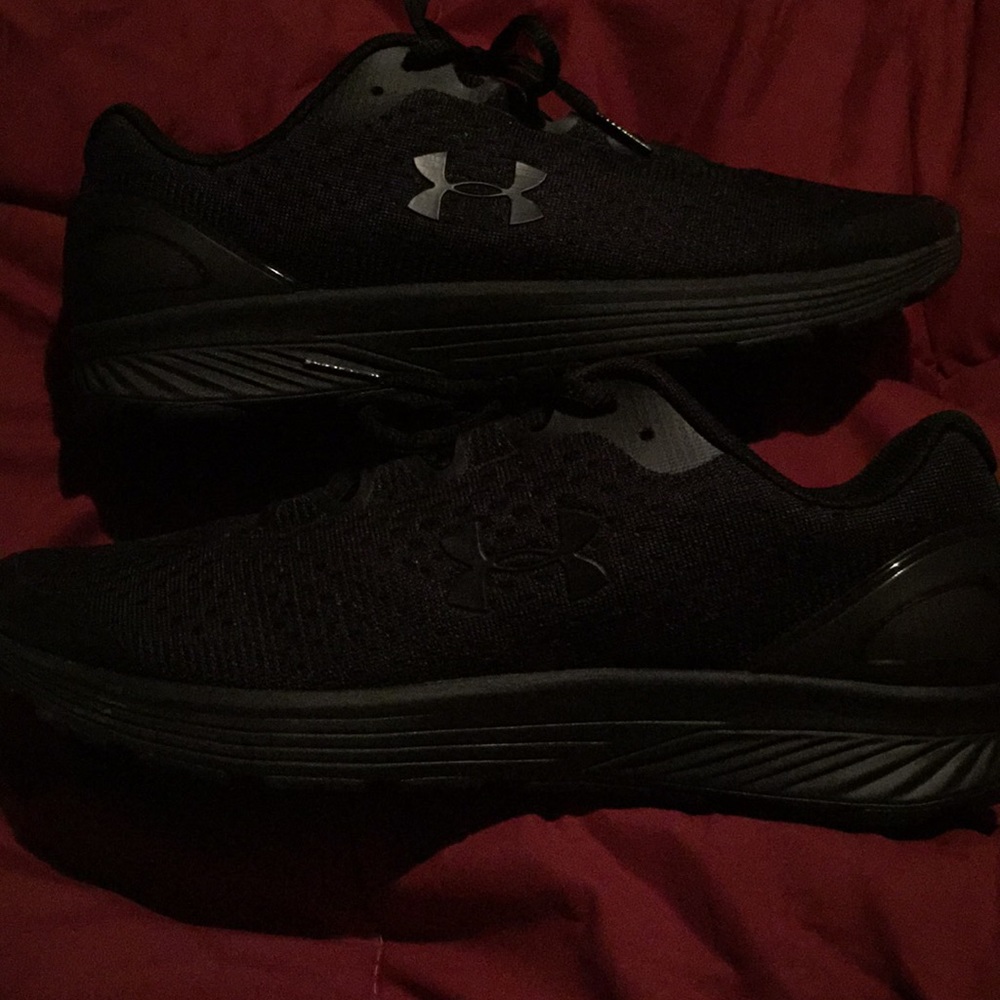 Under Armour tennis shoes. Only worn once!!